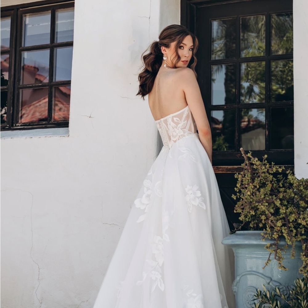 Stella York new with tags, never worn. Size 12. Chic Strapless Ivory Gown - Picture 4 of 12